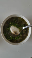 Garnished soup bowl photographed in Tel Aviv