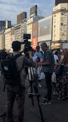 Public gathering with media presence documented near Buenos Aires Obelisco