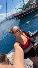 Woman enjoys boat trip off Turkish coast