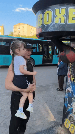 Summer fun at Karaganda's splash pad and arcade area