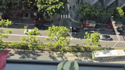 Heavy traffic and emergency response on a central Taipei street