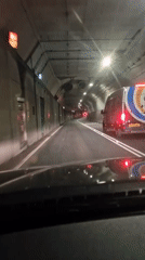 Vehicle travels through dimly lit tunnel in North Tyneside