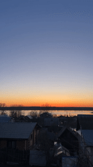Sunset documented by witnesses along river in Chaikovsky, Russia