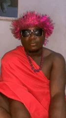 Person in pink headdress photographed in Akwanga, Nigeria
