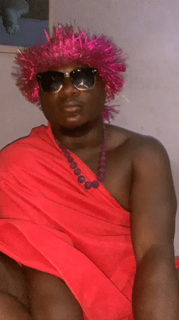 Person in pink headdress photographed in Akwanga, Nigeria