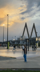 Evening recreation scenes captured around Kazan's Millennium Bridge area
