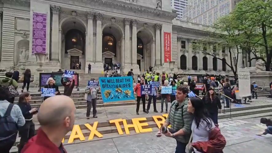 Wealth tax protesters gather at NYC building steps