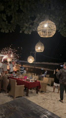 Fire performers entertain crowds at Thailand beach restaurant