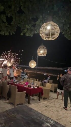 Fire performers entertain crowds at Thailand beach restaurant