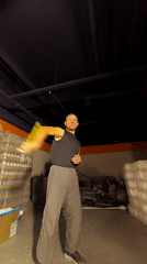 Flow arts practice in a Qarağandı warehouse, July 2026