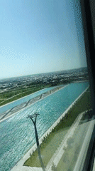 Uzbekistan resort complex with waterways, patios, and fresh flowers