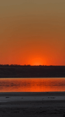 Sunset over Odesa's salt lake, rosé in hand