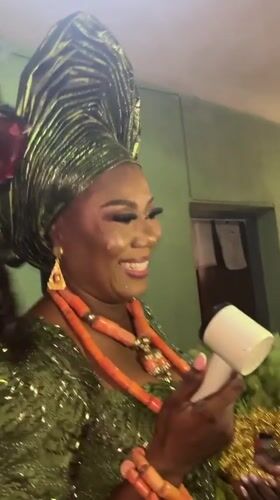 Woman celebrates special occasion in traditional attire in Warri