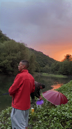 Evening fishing session by the river in rural Bulgaria