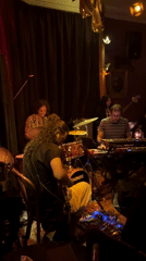 Late-night band performs in dimly lit Mexico City bar