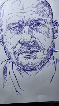Blue pen portrait sketch in progress, Jos Nigeria