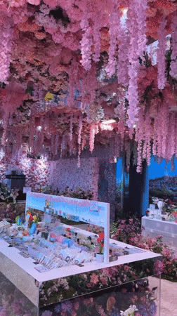 Jeju shop interior blanketed in cascading artificial floral decor