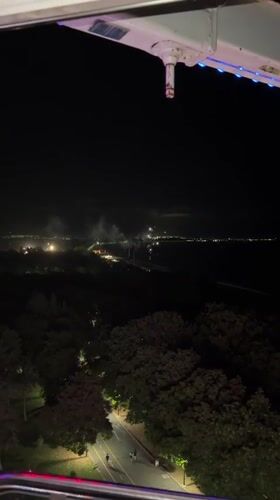 Burgas amusement park at night — Ferris wheel and bumper cars