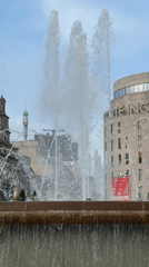 Canaletes Fountain and Plaça de Catalunya on a summer afternoon