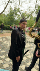 Youth band parades with Bulgarian flags in Varshets