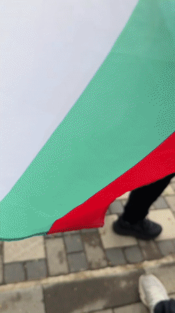 Youth band parades with Bulgarian flags in Varshets