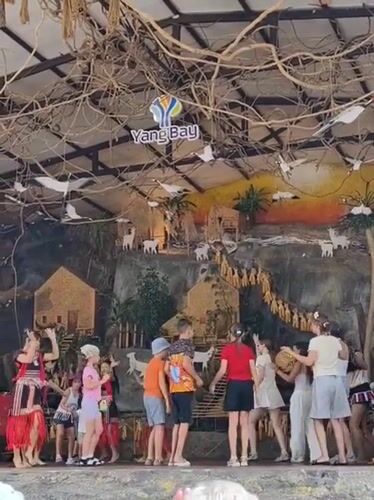 A day out at a waterfall nature park with swimming and cultural performances.
