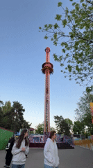 Amusement park visitors enjoy rides in Minsk, Belarus