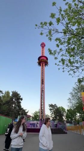 Amusement park visitors enjoy rides in Minsk, Belarus