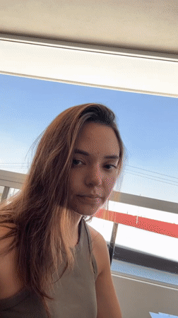 Woman works with laser engraver in Mexico workspace