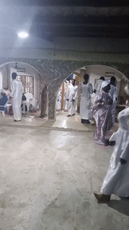 Religious gathering with white-robed congregation observed in Lokoja, Nigeria
