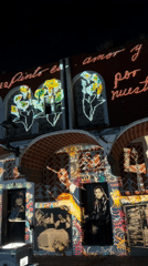 Nighttime art projections illuminate historic Puebla buildings and streets