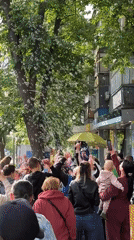 Street performer draws crowd with bubble show in Kharkiv