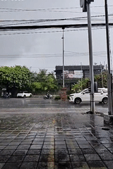 Rainy street scene captured in Kuta Selatan, Indonesia