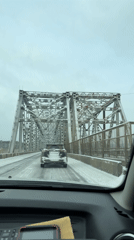 Dashcam captures snowy bridge crossing in Ust-Ilimsk, Russia
