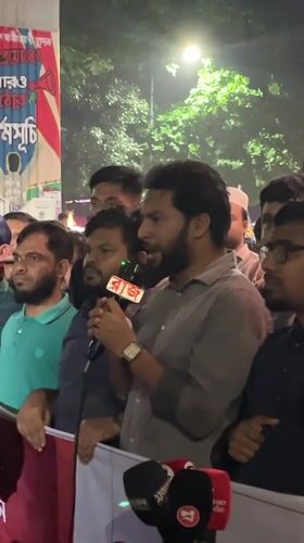 Nighttime rally draws crowds around illuminated monument in Dhaka