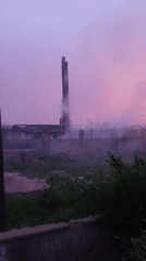 Drilling rig operates at sunset in Jos, Nigeria
