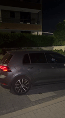 Grey VW Golf parked at night in Sofia