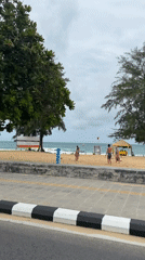 Late night beach volleyball and cycling activity in Karon