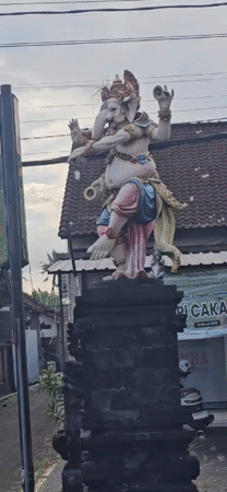 Ornate Ganesha statue spotted on stone pillar in Sukawati