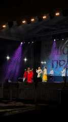 Traditional folk performance held at outdoor nighttime event in Bulgaria