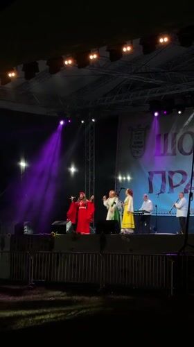 Traditional folk performance held at outdoor nighttime event in Bulgaria