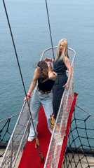 Two women spotted on elevated platform over blue waters in Turkey