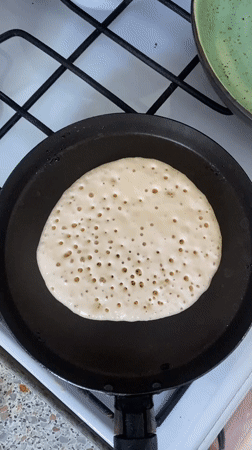 Morning pancake cooking captured in Rusanovo kitchen