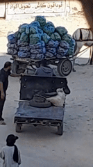 Daily life and goods movement through a Khan Yunis displacement camp
