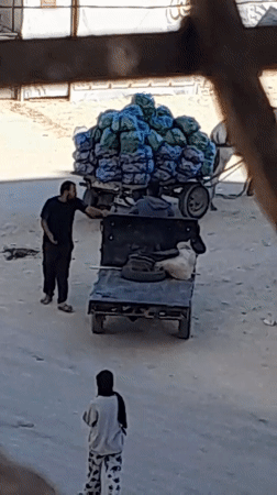 Daily life and goods movement through a Khan Yunis displacement camp