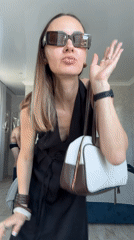 Woman takes mirror selfies with companion in Sochi residence
