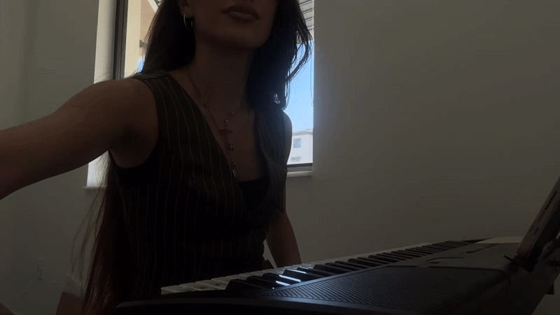 Digital piano practice in natural window light, Hallandale Beach