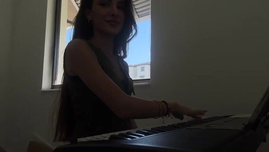 Digital piano practice in natural window light, Hallandale Beach