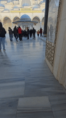 Visitors walk across Çamlıca Mosque courtyard in Üsküdar
