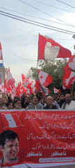 Men stage street protest with flags in Quetta, Pakistan